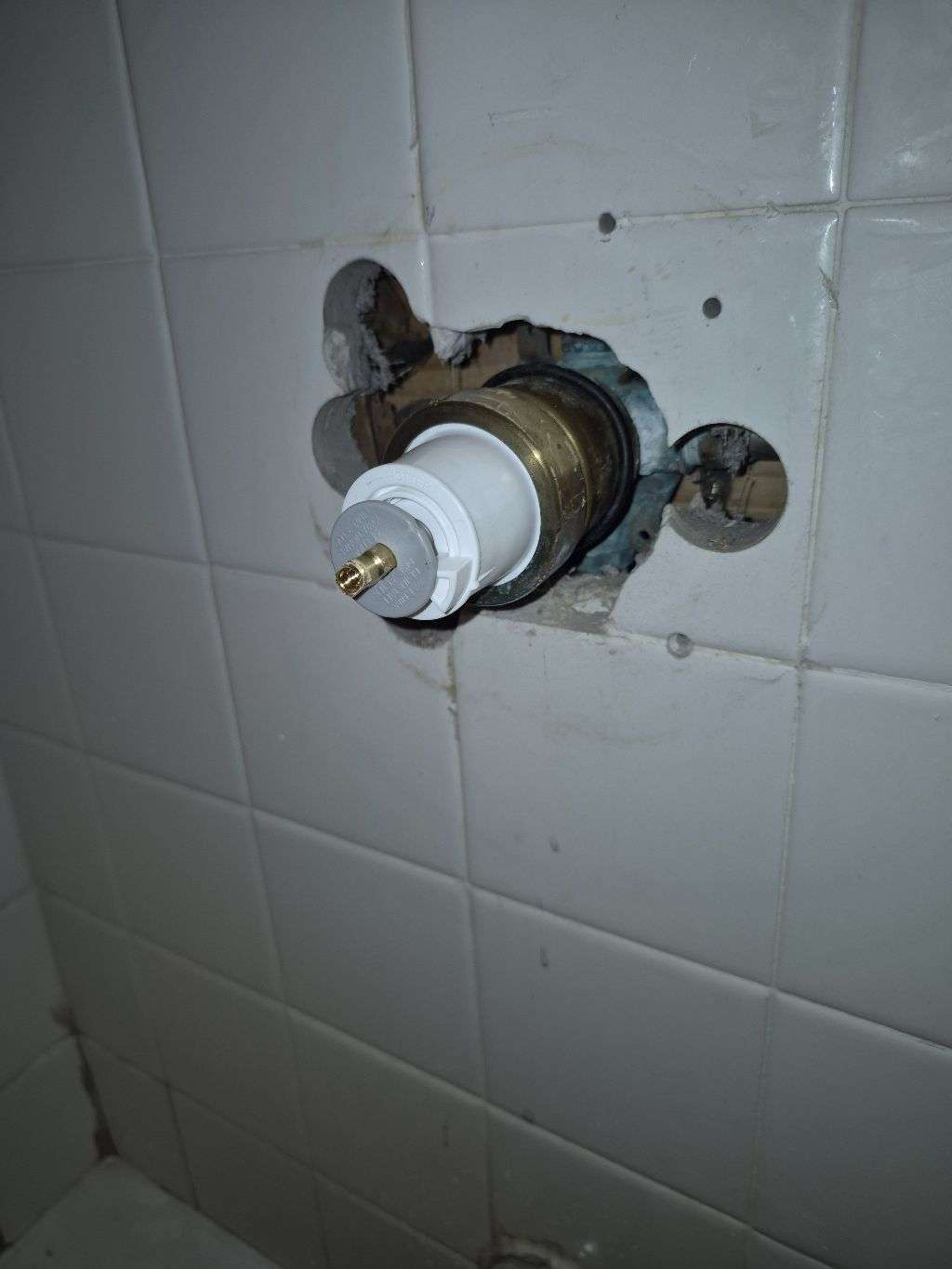 Replacement shower cartridge installed in the existing Carlsbad valve, before the trim was reinstalled.